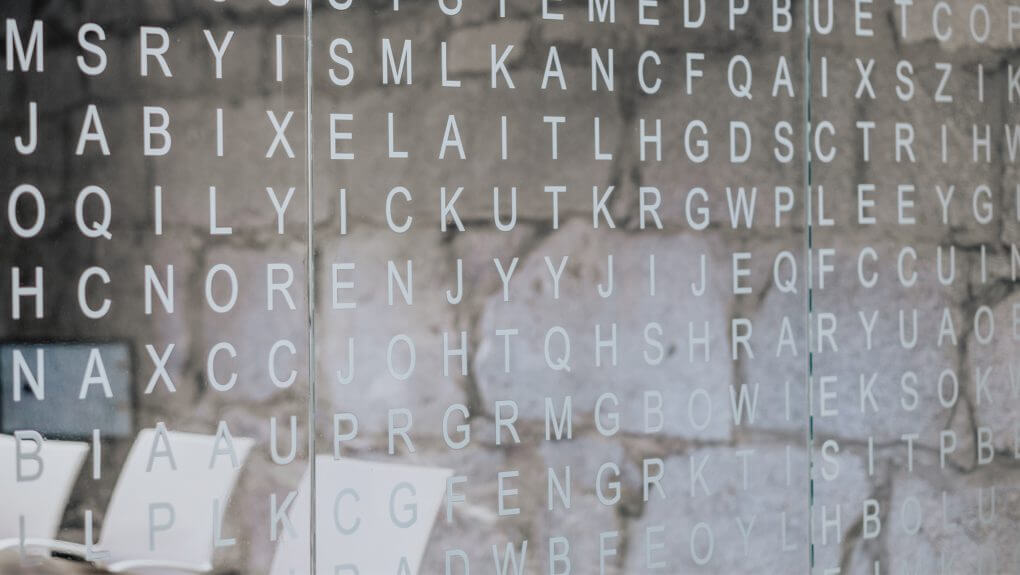 crossword image on the glasswall at Thalorix SEO office